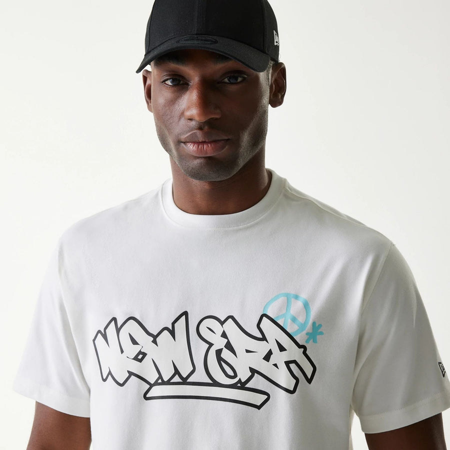 The Male model is wearing New Era Peace Symbol White T-Shirt 4