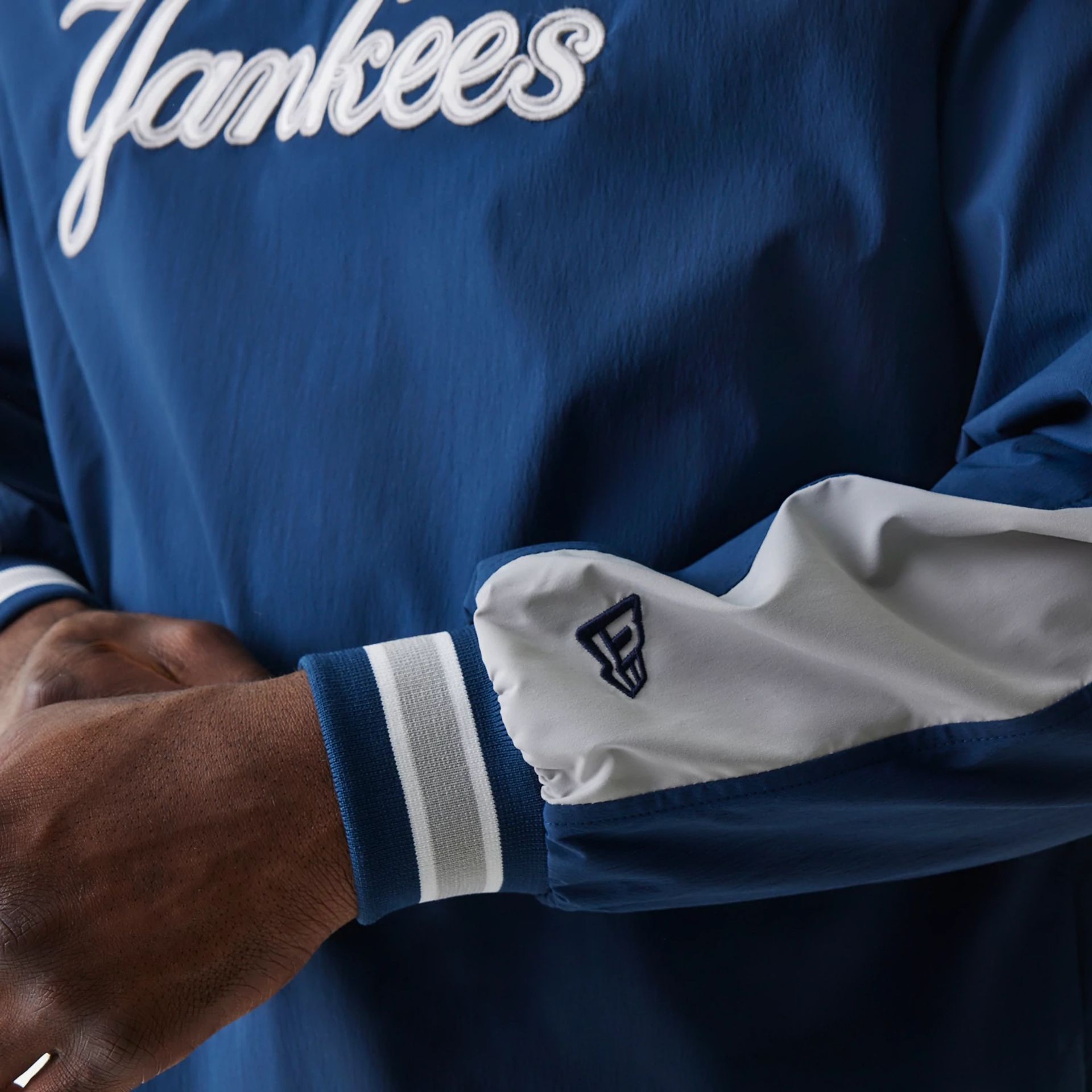 The Male model is wearing New York Yankees MLB Navy U Neck Pullover Windbreaker 6