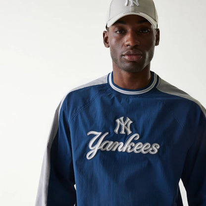 The Male model is wearing New York Yankees MLB Navy U Neck Pullover Windbreaker 5