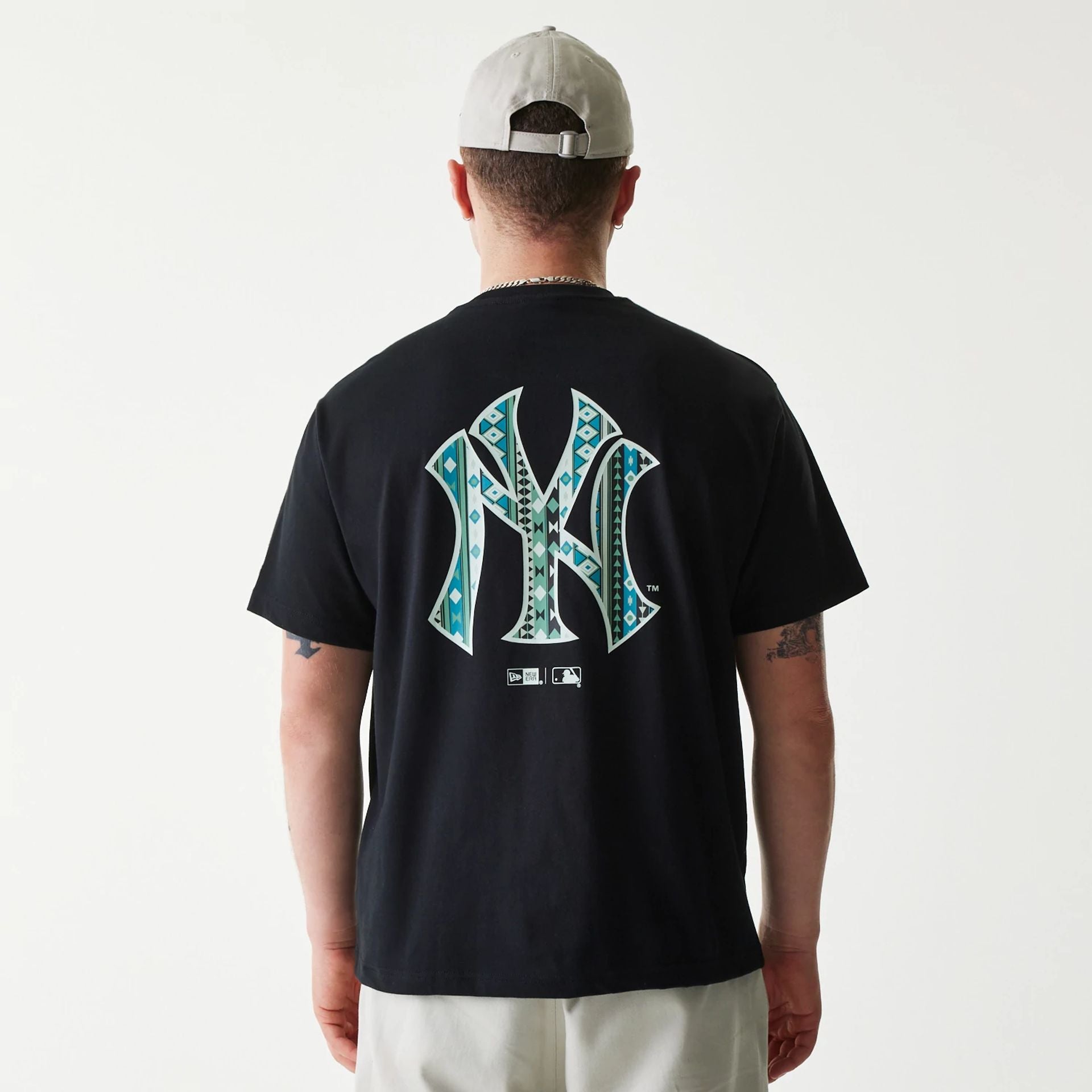 The Male model is wearing New York Yankees MLB Navajo Pattern Black T-Shirt 2