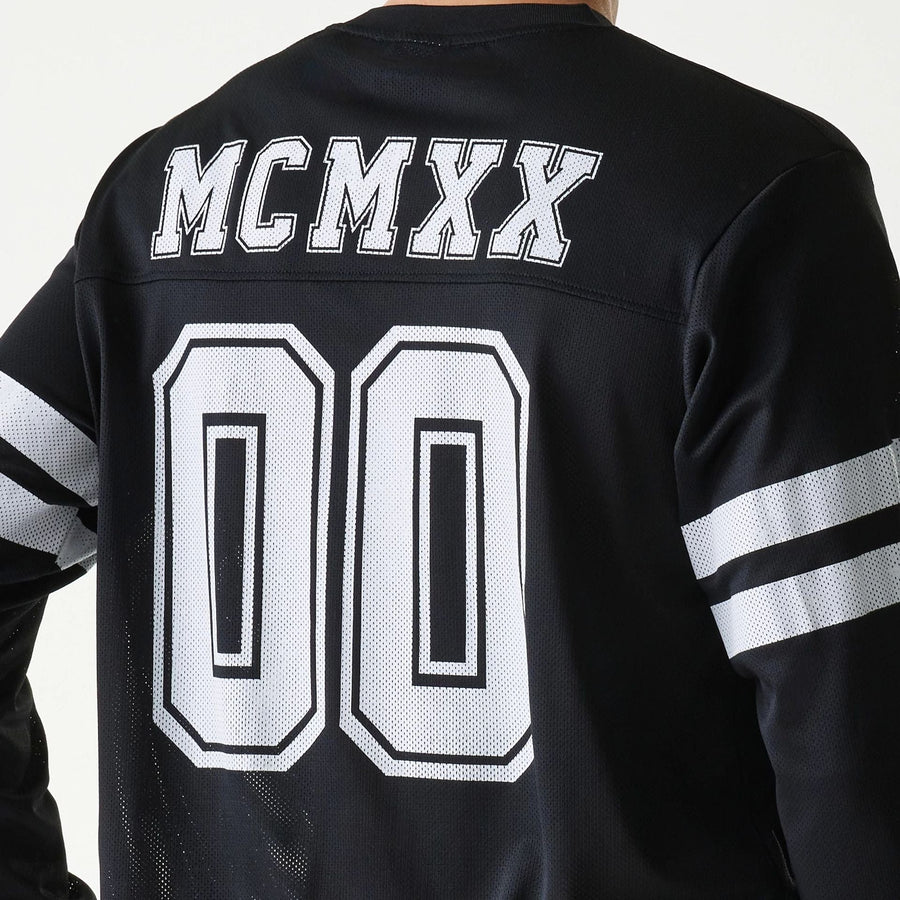 The Male model is wearing New Era Mesh Water Black Long Sleeve T-Shirt 4