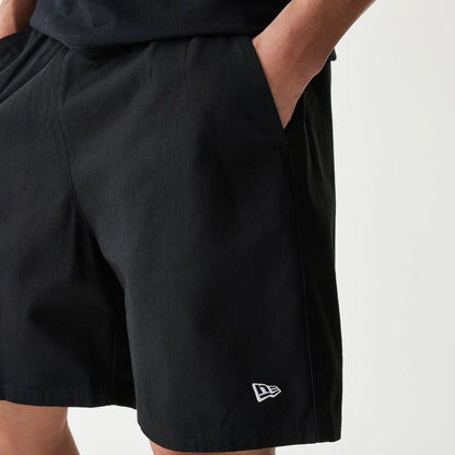 The Male model is wearing New Era Japan Woven Black Shorts 3
