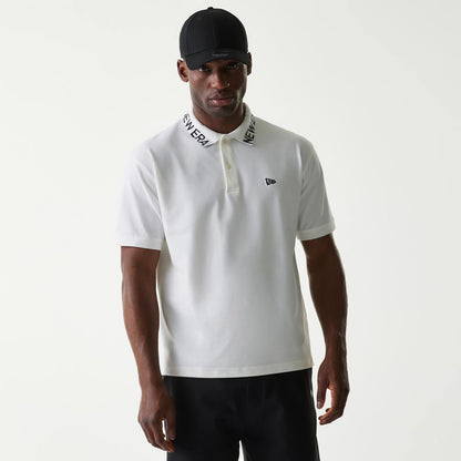 The Male model is wearing New Era Japan Collar Logo White Polo T-Shirt 1