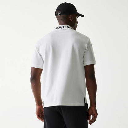 The Male model is wearing New Era Japan Collar Logo White Polo T-Shirt 2