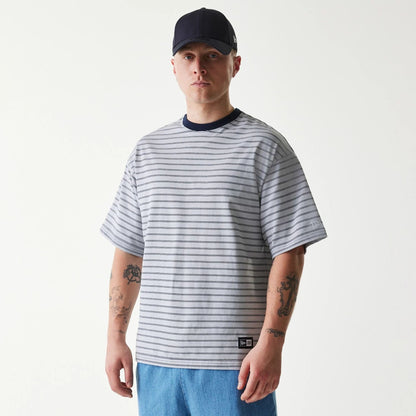 The Male model is wearing New Era Japan White T-Shirt 1