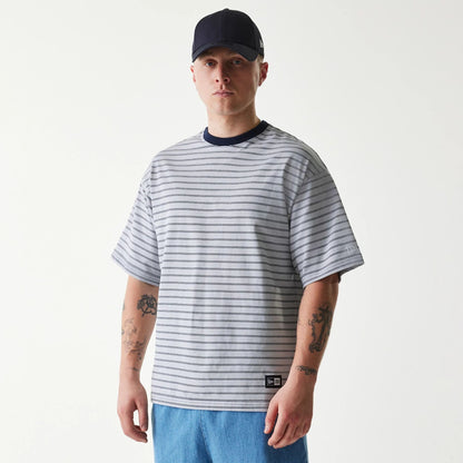 The Male model is wearing New Era Japan White T-Shirt 1