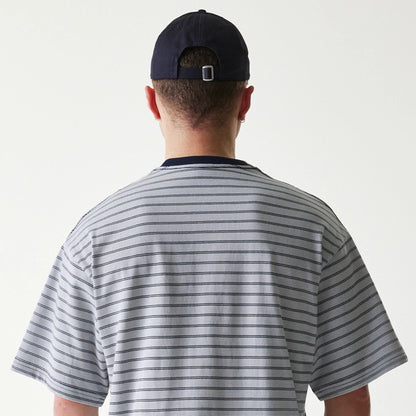 The Male model is wearing New Era Japan White T-Shirt 5