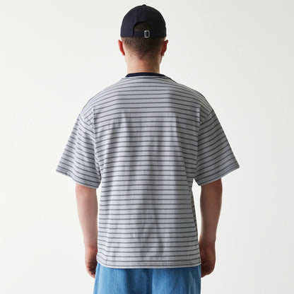 The Male model is wearing New Era Japan White T-Shirt 2