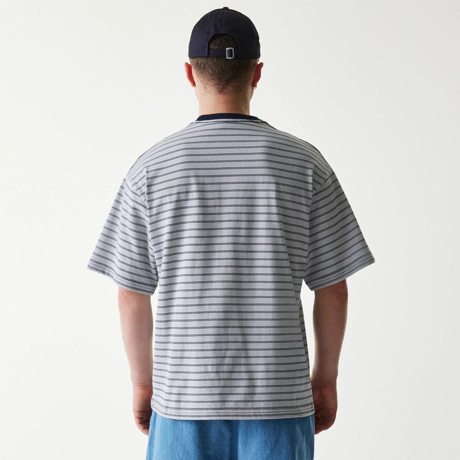 The Male model is wearing New Era Japan White T-Shirt 2