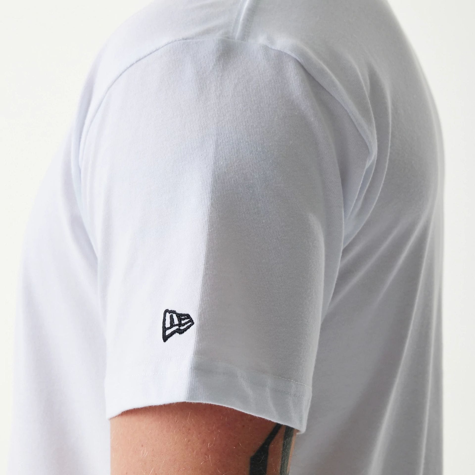 The Male model is wearing New Era Japan Mini Flag Logo White T-Shirt 3