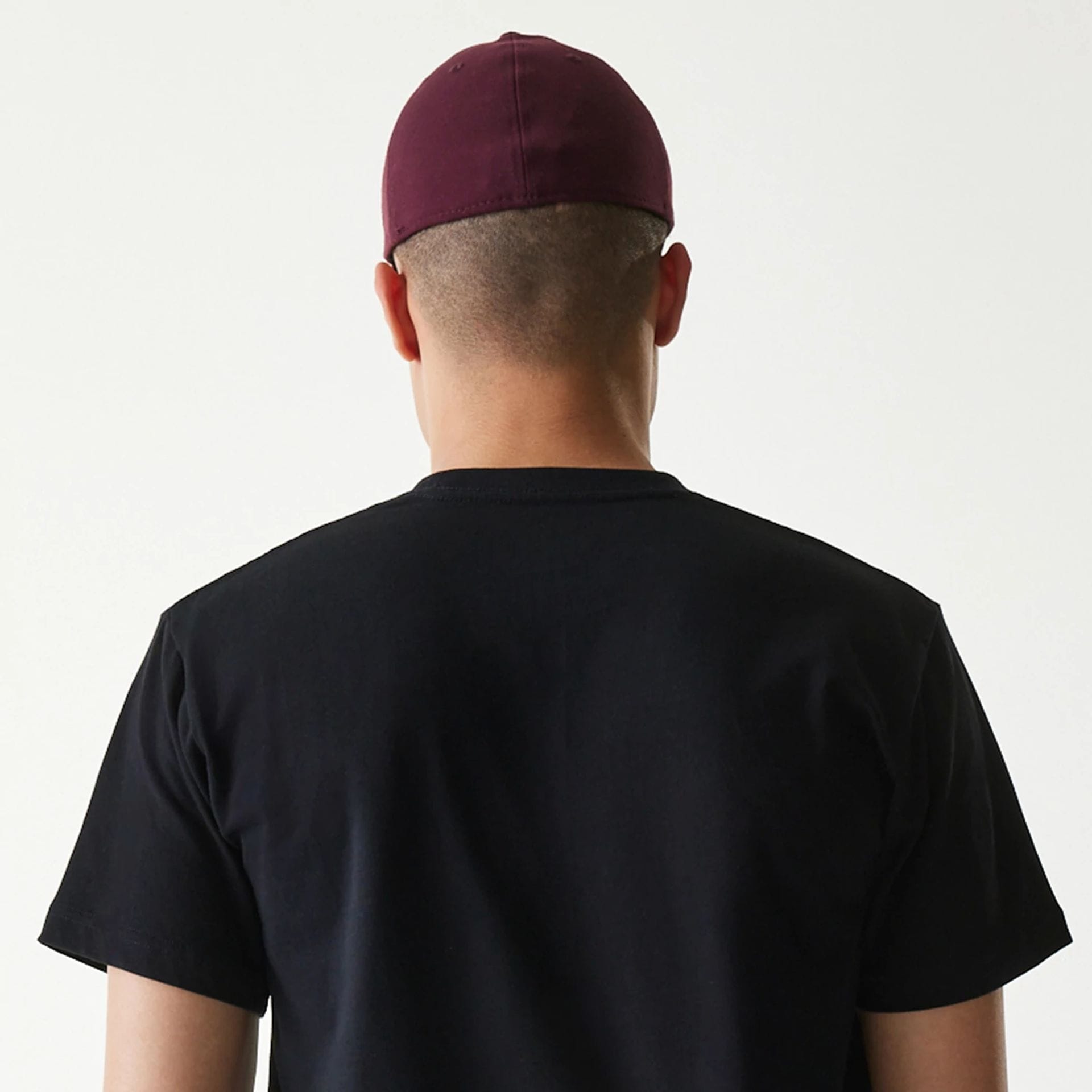 The Male model is wearing New Era Japan Mini Flag Logo Black T-Shirt 5
