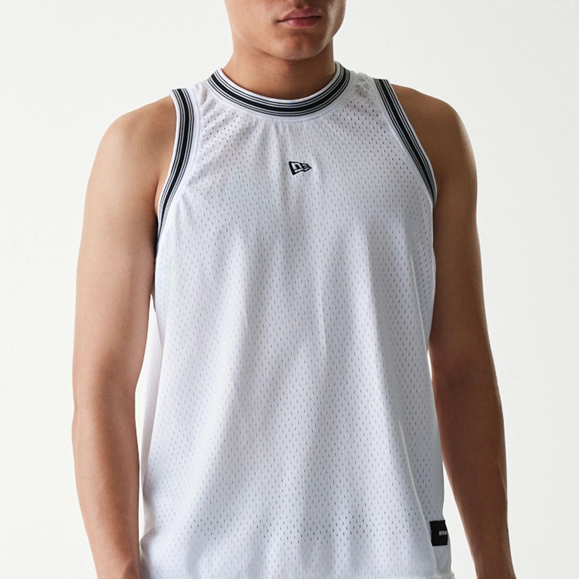 The Male model is wearing New Era Japan Mesh White Sleeveless T-Shirt 3