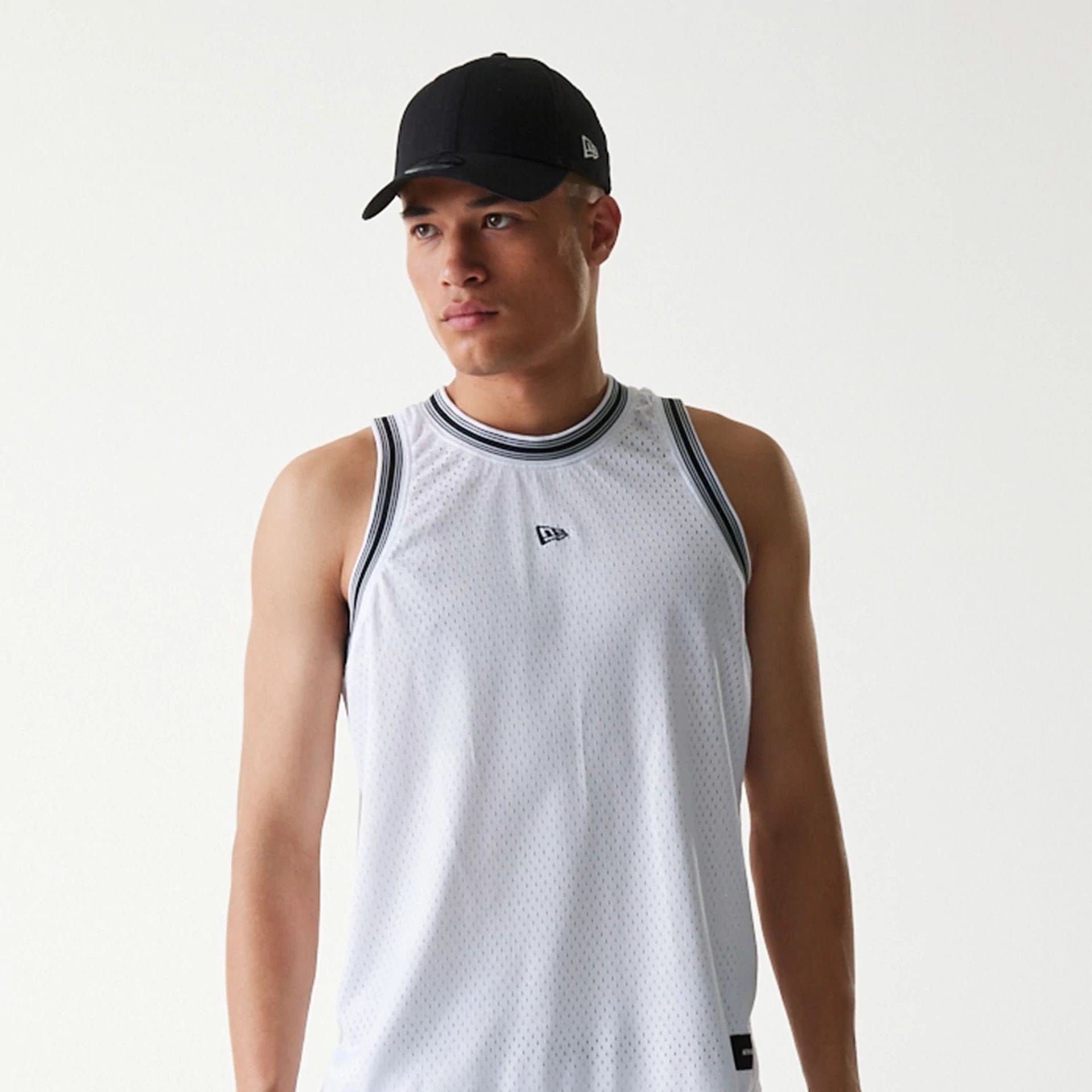 The Male model is wearing New Era Japan Mesh White Sleeveless T-Shirt 5