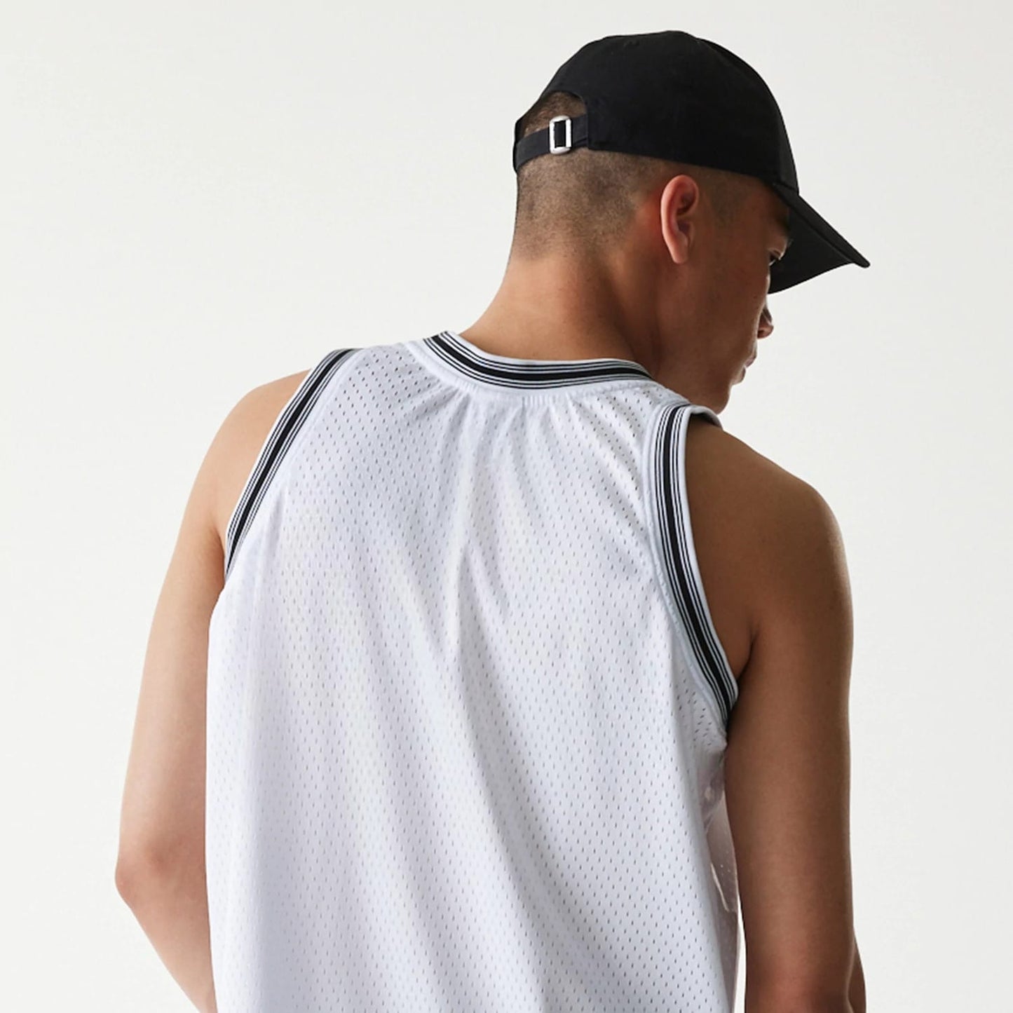 The Male model is wearing New Era Japan Mesh White Sleeveless T-Shirt 6