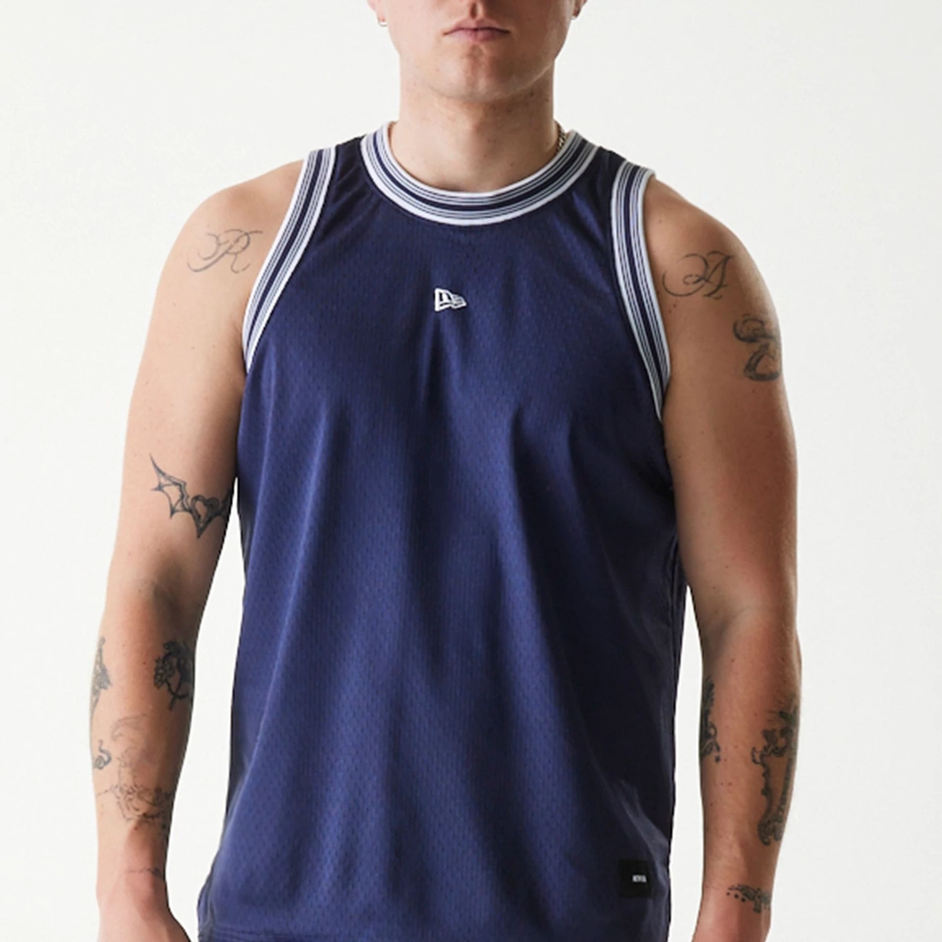 The Male model is wearing New Era Japan Mesh Navy Sleeveless T-Shirt 3