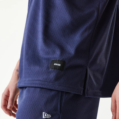 The Male model is wearing New Era Japan Mesh Navy Sleeveless T-Shirt 4