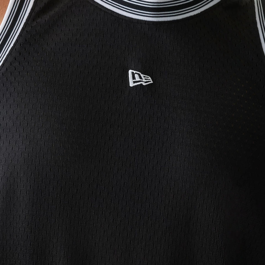 The Male model is wearing New Era Japan Mesh Black Sleeveless T-Shirt 3