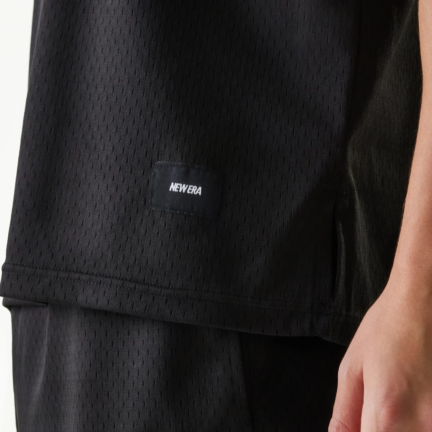 The Male model is wearing New Era Japan Mesh Black Sleeveless T-Shirt 4