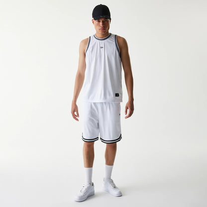 New Era Japan Mesh White Shorts, on-model view featuring white shorts with a raised logo on the left leg hem, black trim detail along the edges, paired with a matching mesh top and a black cap.
