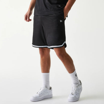 The Male model is wearing New Era Japan Mesh Black Shorts 1