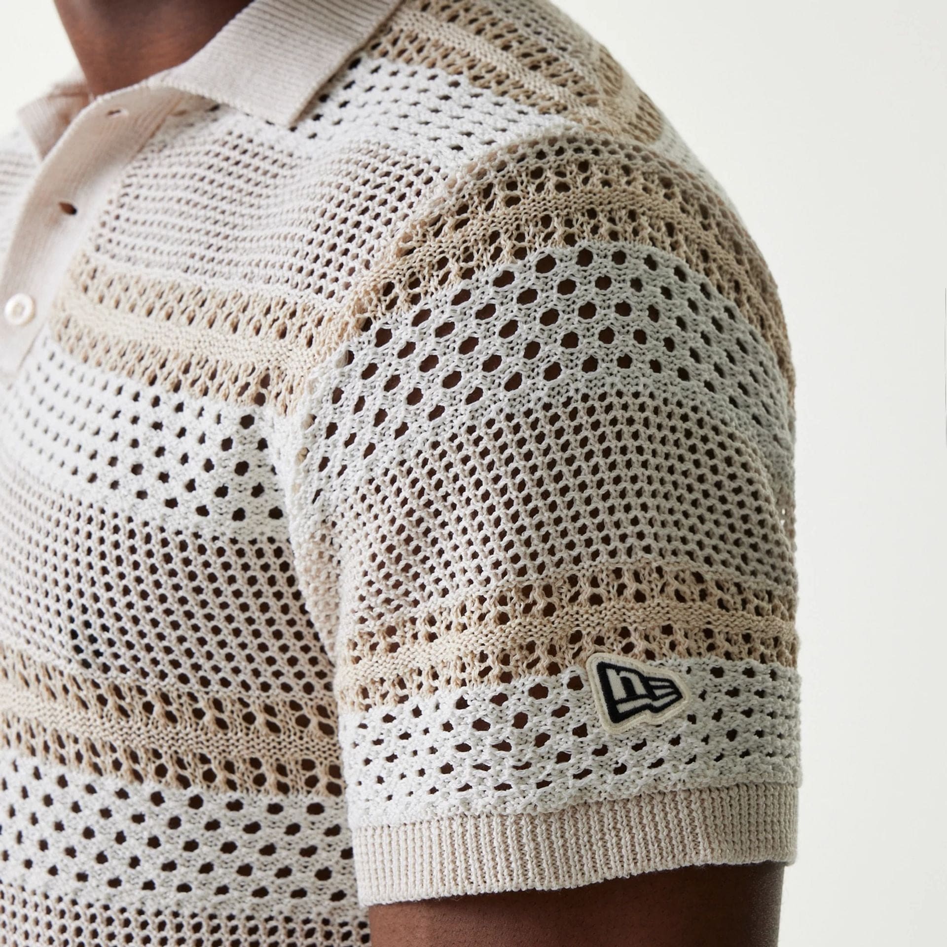 The Male model is wearing New Era Japan Mesh White Polo T-Shirt 4