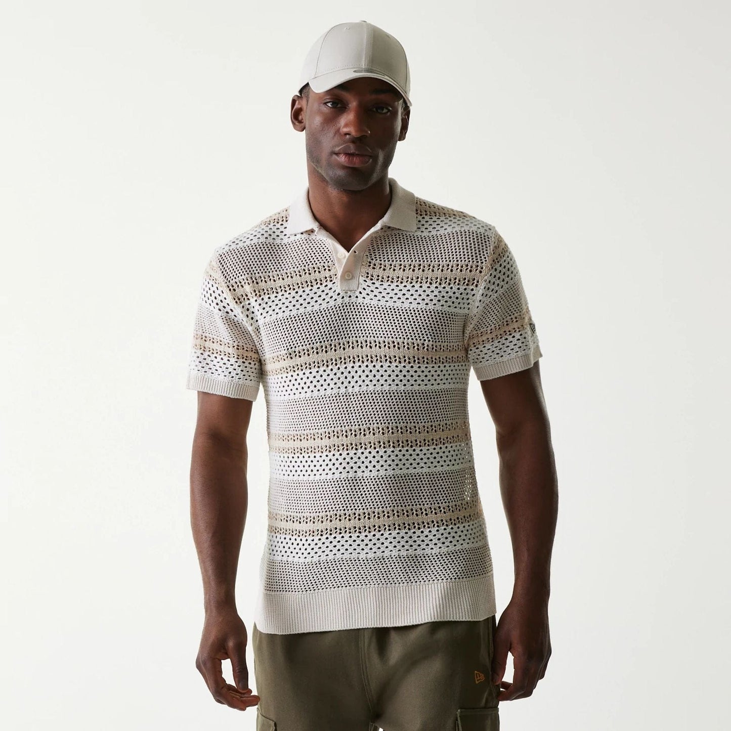 The Male model is wearing New Era Japan Mesh White Polo T-Shirt 1
