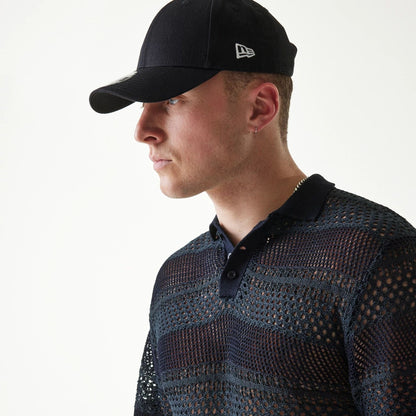 The Male model is wearing New Era Japan Mesh Black Polo T-Shirt 3