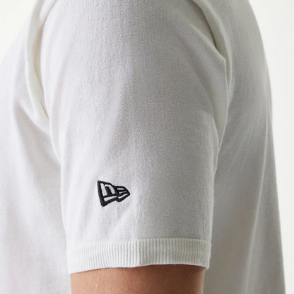 The Male model is wearing New Era Japan White Polo T-Shirt 4