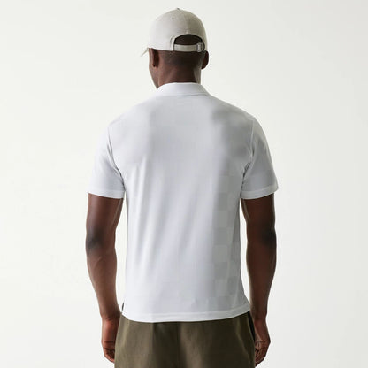 The Male model is wearing New Era Japan Grid White Polo T-Shirt 2