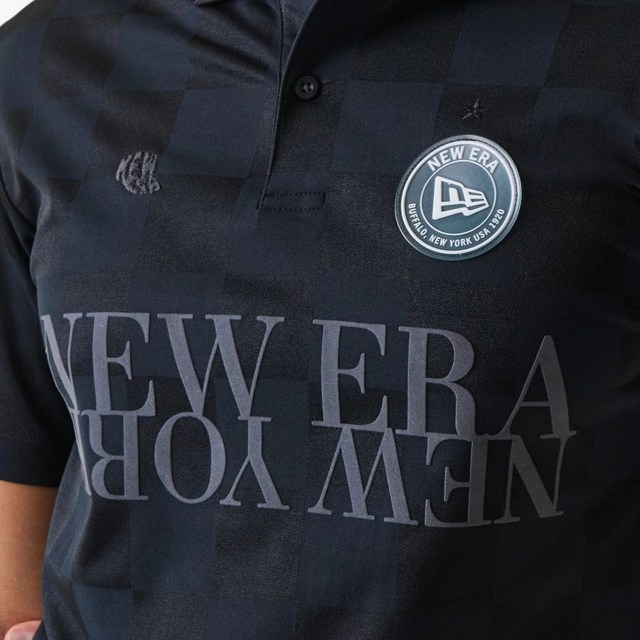 The Male model is wearing New Era Japan Grid Black Polo T-Shirt 3