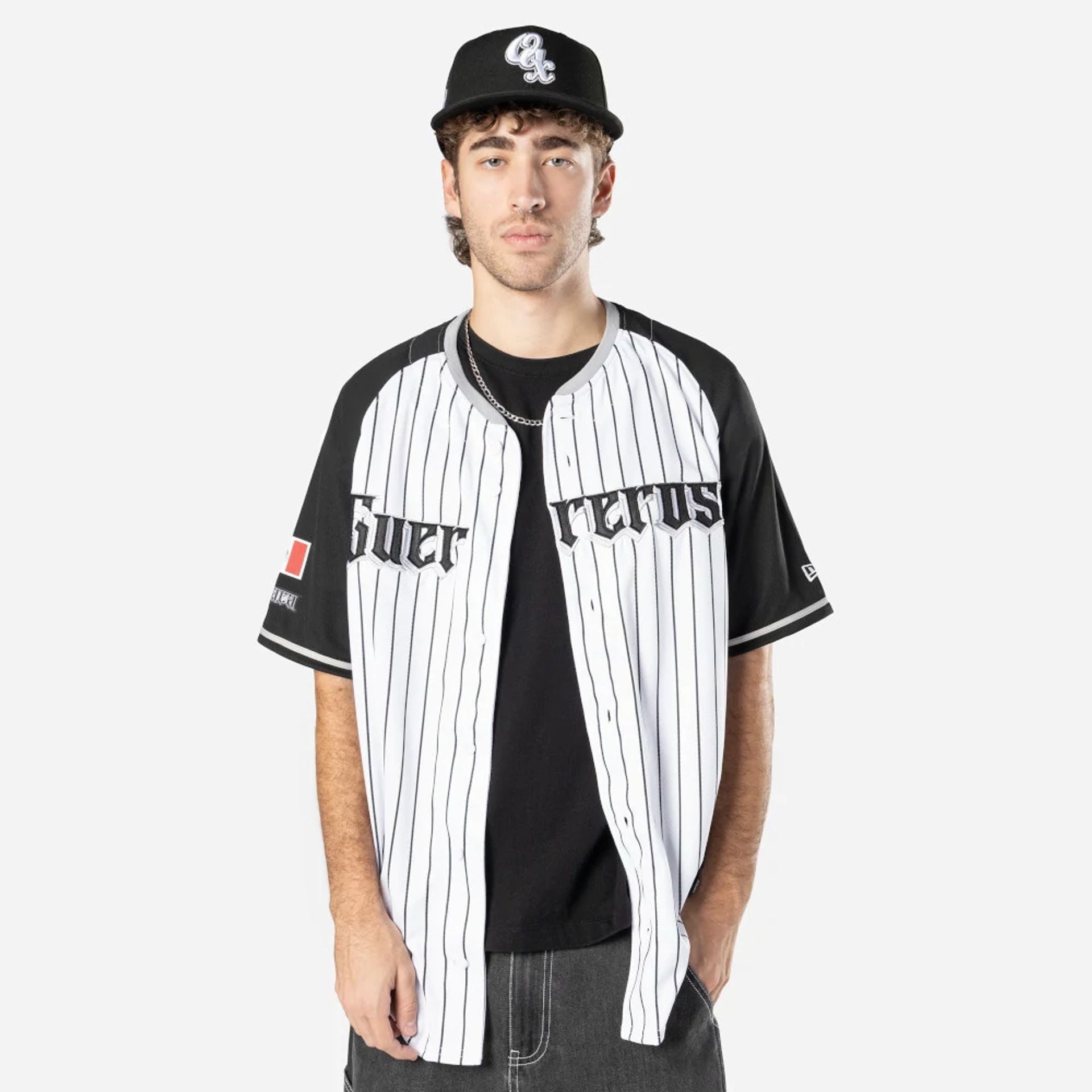 The Male model is wearing Oaxaca Guerreros Mexico LMB On Field White On-Field Jersey 1