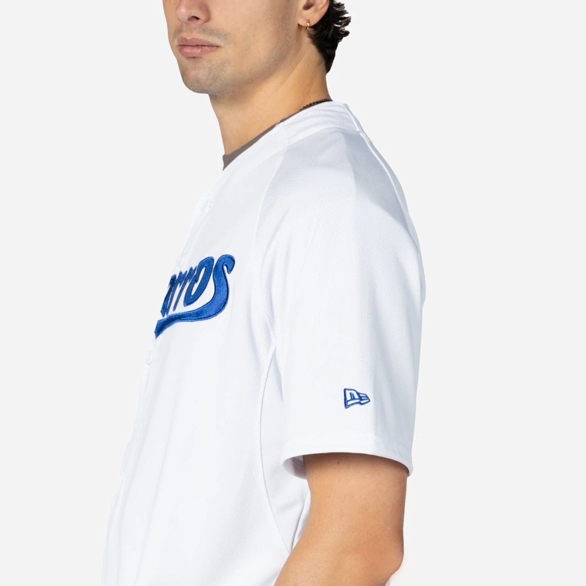 The Male model is wearing Charros De Jalisco Mexico LMB On Field White On-Field Jersey 5