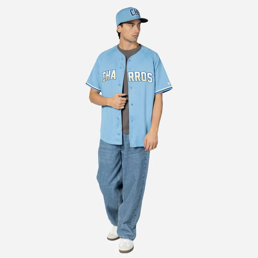 The Male model is wearing Charros De Jalisco Mexico LMB On Field Pastel Blue On-Field Jersey 7