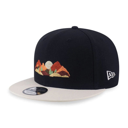 Pictured is this New Era Mountain Logo 9FIFTY Snapback cap in black. 1