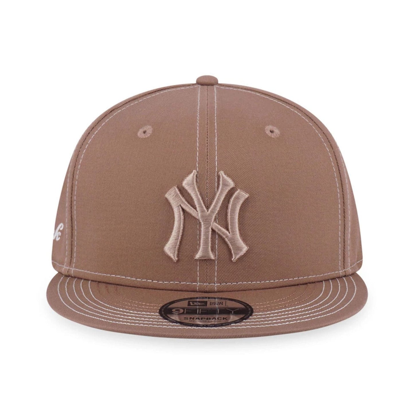 Pictured is this MLB Contrast Stitching New York Yankees 9FIFTY Snapback cap in beige. 2