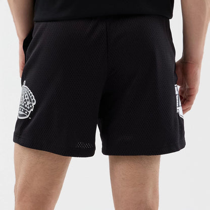 The Male model is wearing LA Kings NHL Street Culture Black Oversized Shorts  6