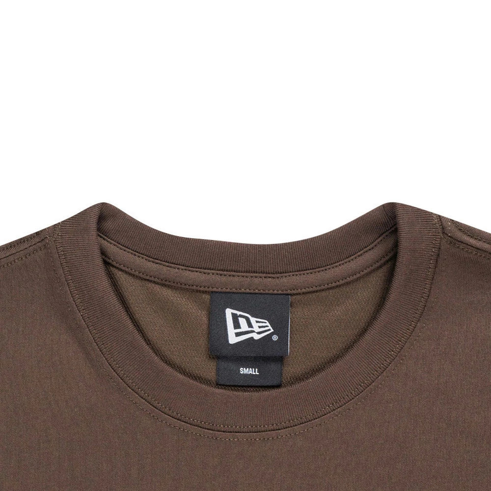 The model is wearing this New Era Year Of The Horse T-Shirt in brown. 5