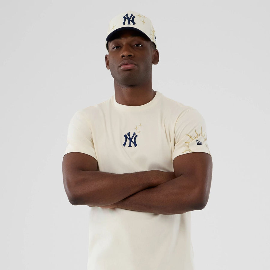 The model is wearing this MLB Cosmic Craft New York Yankees T-Shirt in white. 7