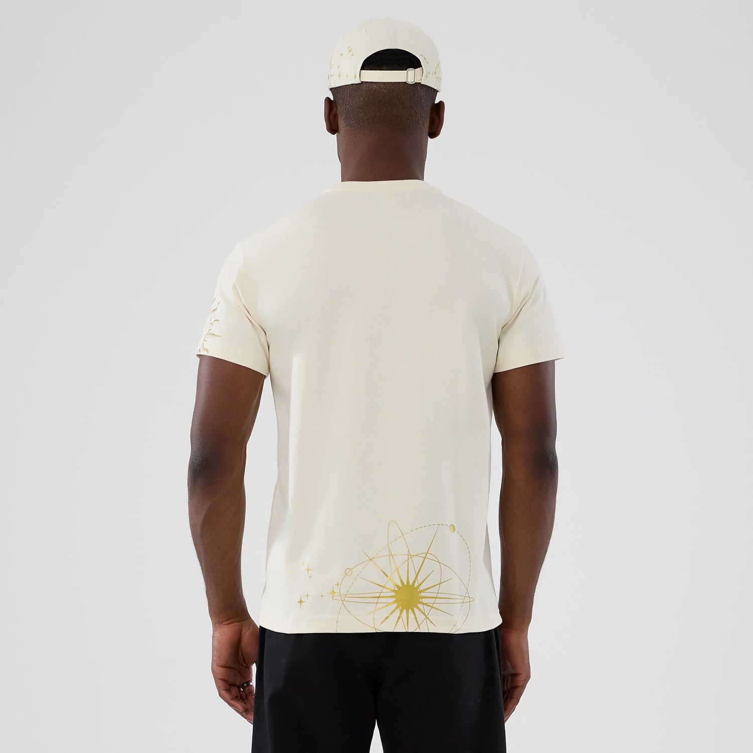 The model is wearing this MLB Cosmic Craft New York Yankees T-Shirt in white. 2