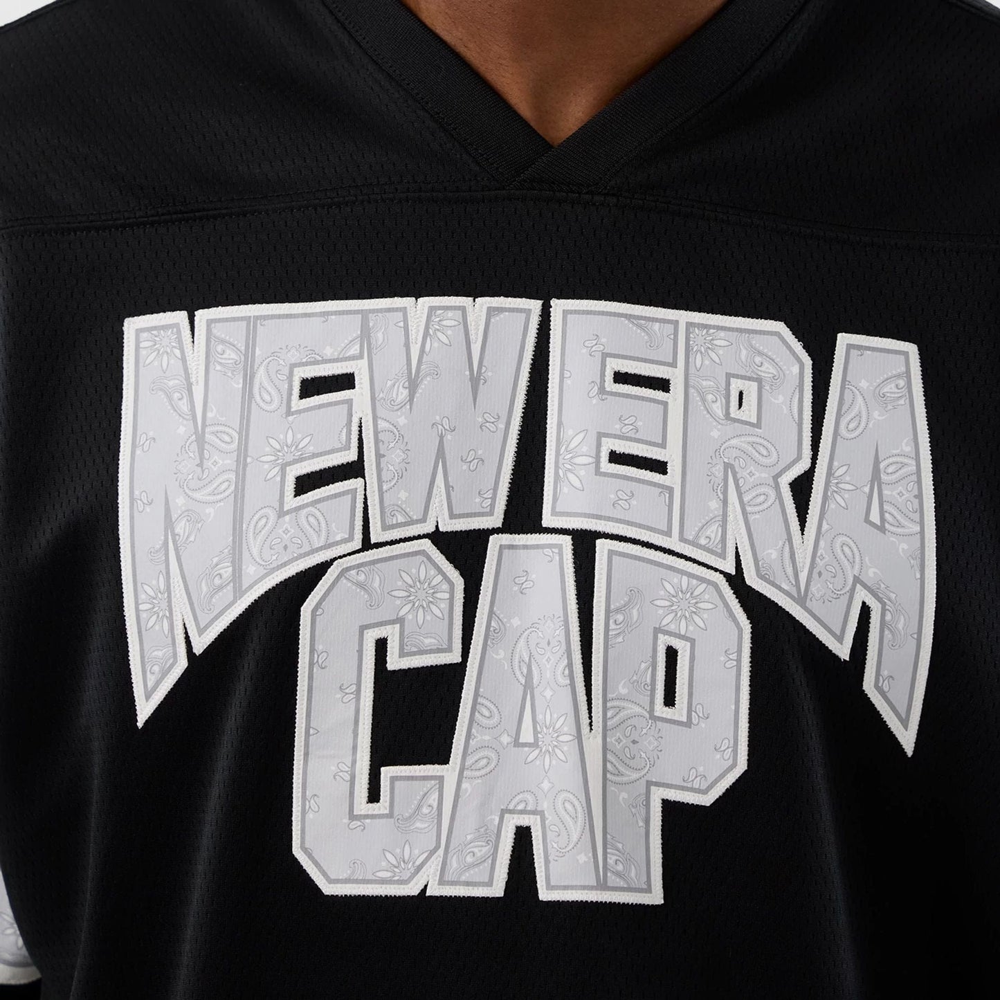 The Male model is wearing  New Era Street Swing Black T-Shirt  3