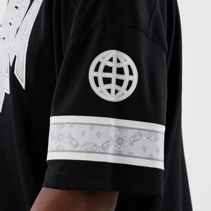 The Male model is wearing  New Era Street Swing Black T-Shirt  6