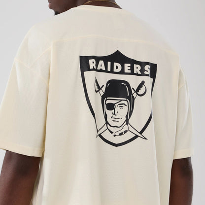 The model is wearing this NFL Historic Las Vegas Raiders Oversized T-Shirt in cream. 6