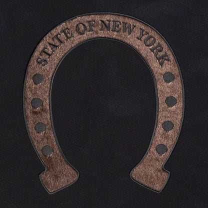 The model is wearing this New Era Year Of The Horse Jacket in black. 3