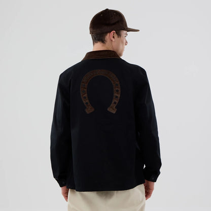 The model is wearing this New Era Year Of The Horse Jacket in black. 2