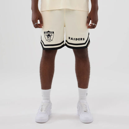 The model is wearing these NFL Historic Las Vegas Raiders shorts in cream. 1