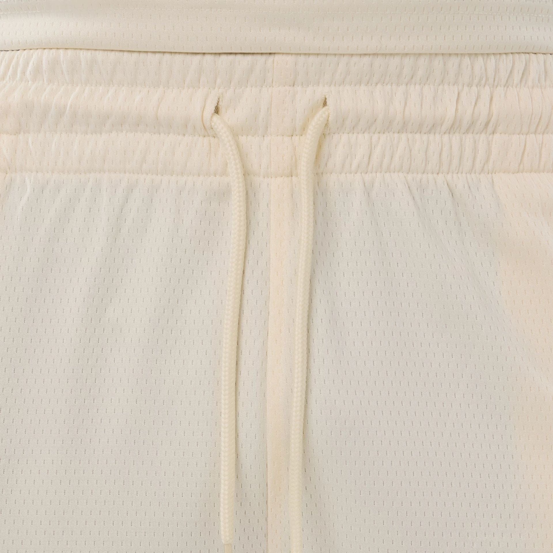 The model is wearing these NFL Historic Las Vegas Raiders shorts in cream. 6