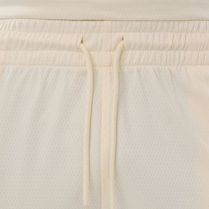 The model is wearing these NFL Historic Las Vegas Raiders shorts in cream. 6