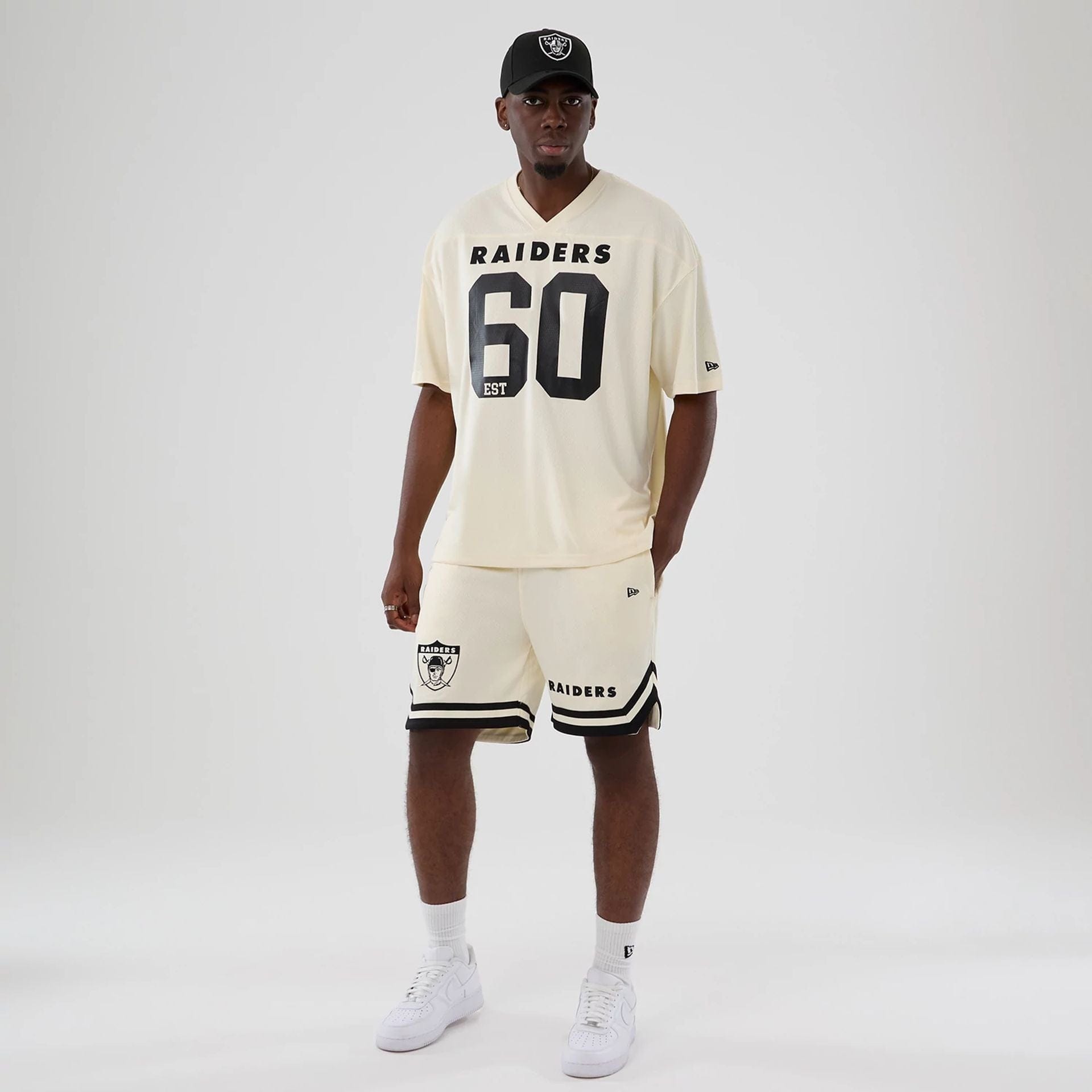 The model is wearing these NFL Historic Las Vegas Raiders shorts in cream. 8