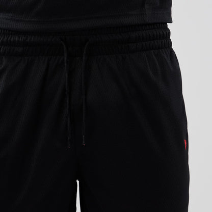 The model is wearing these NFL Historic Kansas City Chiefs shorts in black. 6