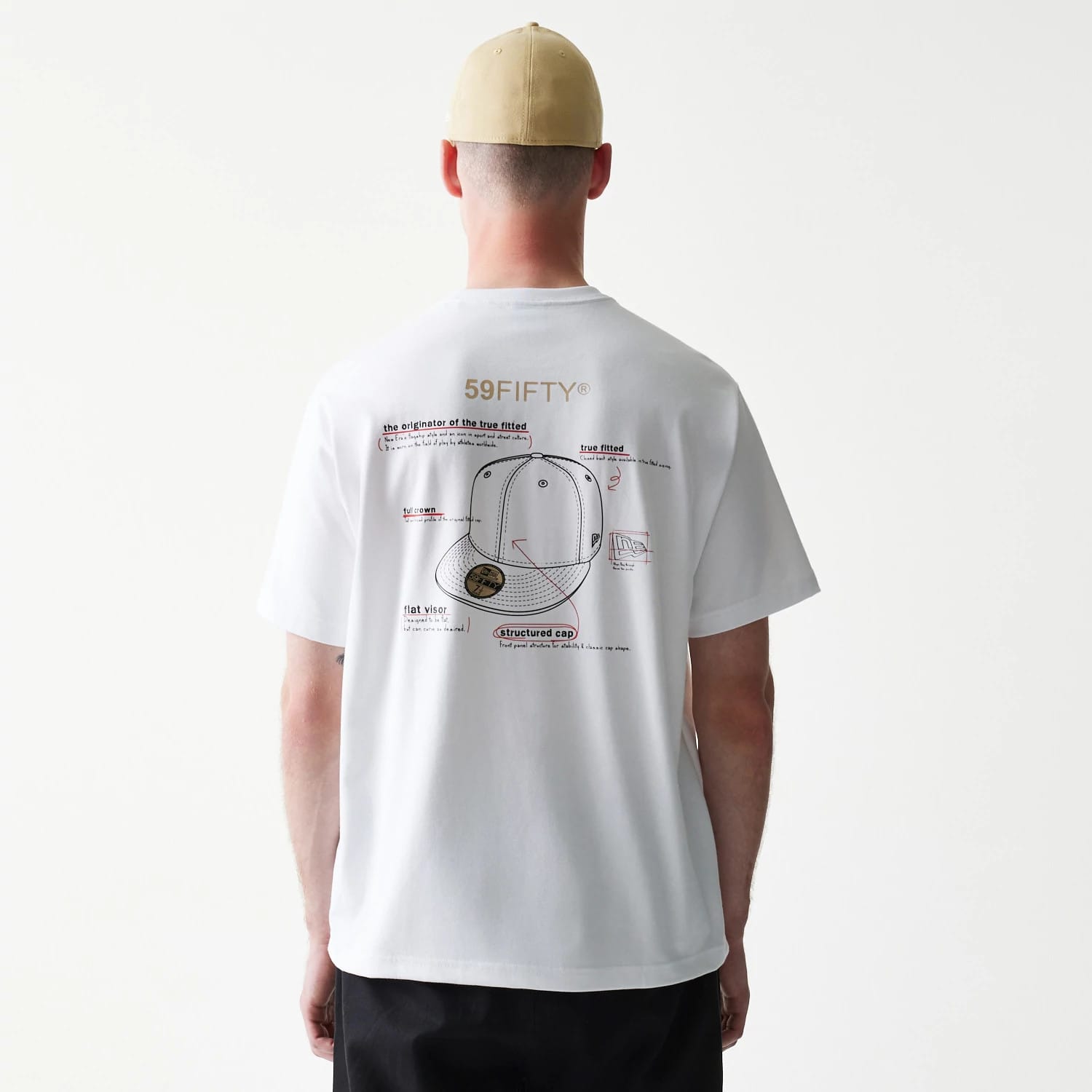 The Male model is wearing 59FIFTY Fitted Cap Description White T-Shirt 2